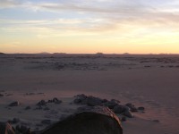Soleil couchant sur le dsert